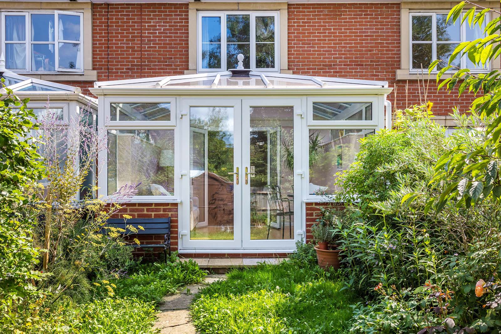 Closed white uPVC French doors.