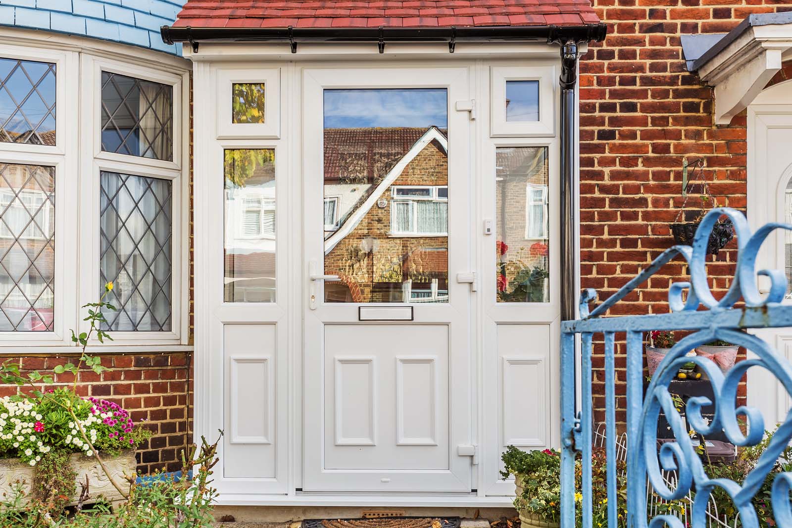 White uPVC front door and frames.