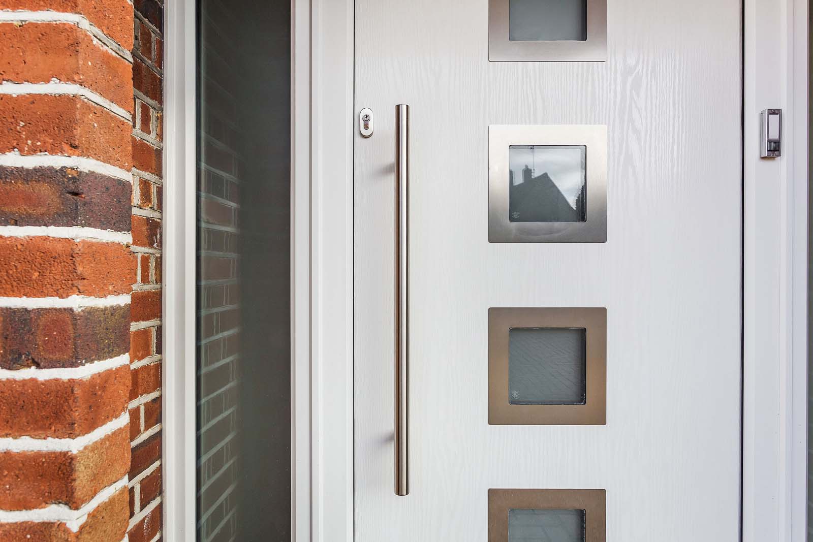 A white composite door in Surrey.