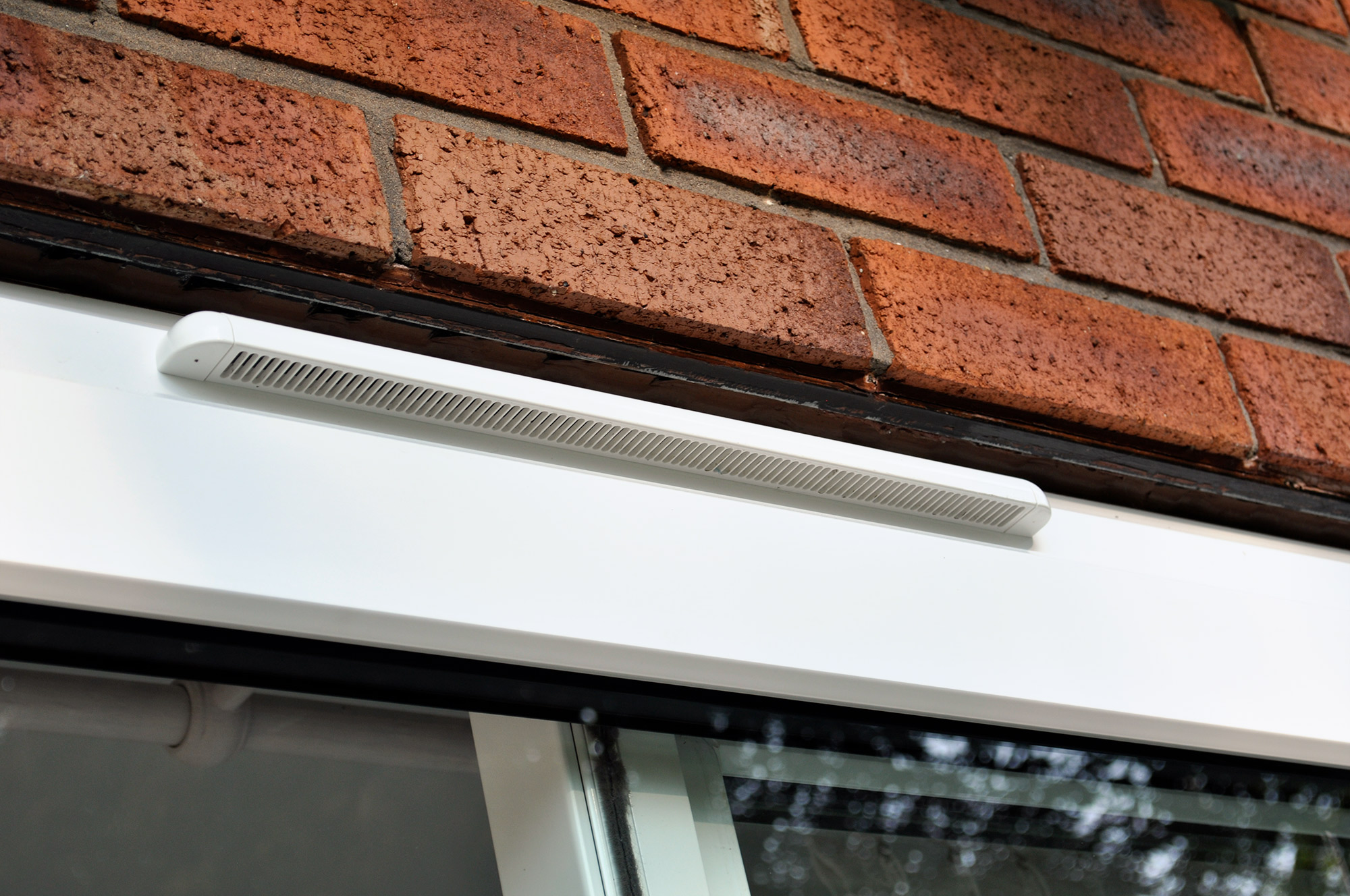 White patio door frames in a Surrey home.