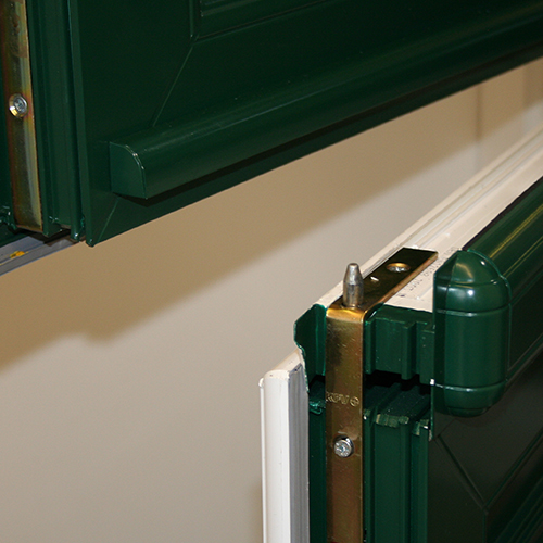 A close up shot of a green stable door in Surrey.
